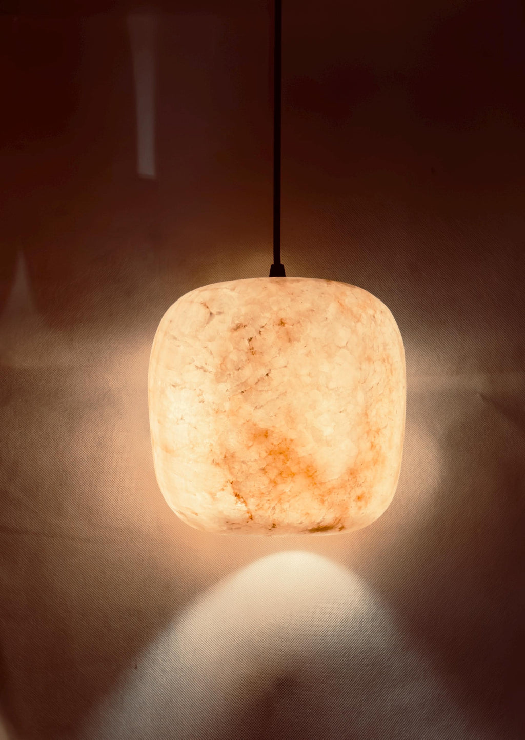 Natural Brown alabaster pendant light with black cord. Cieling Lights . Hanging Lamps