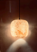 Natural Brown alabaster pendant light with black cord. Cieling Lights . Hanging Lamps